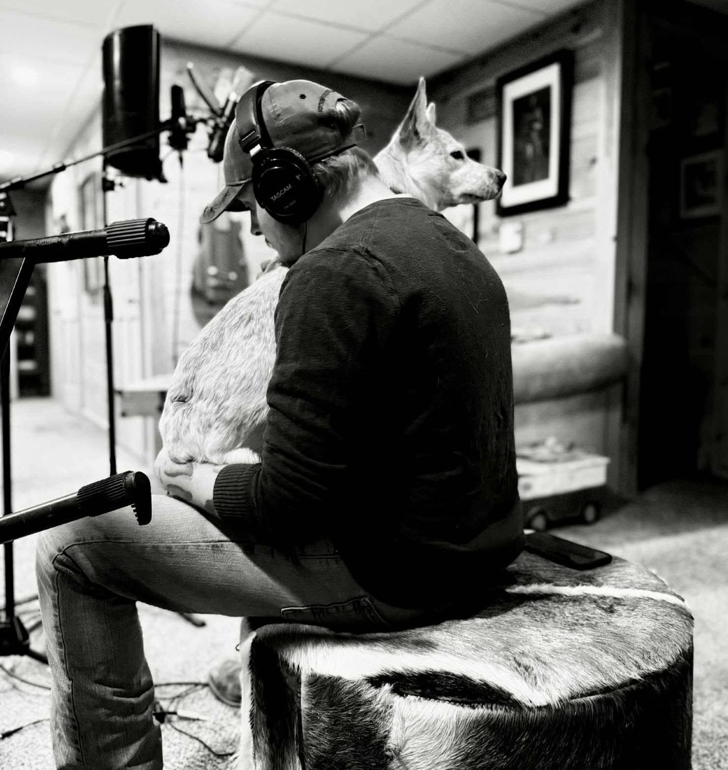 Robbie at a studio microphone